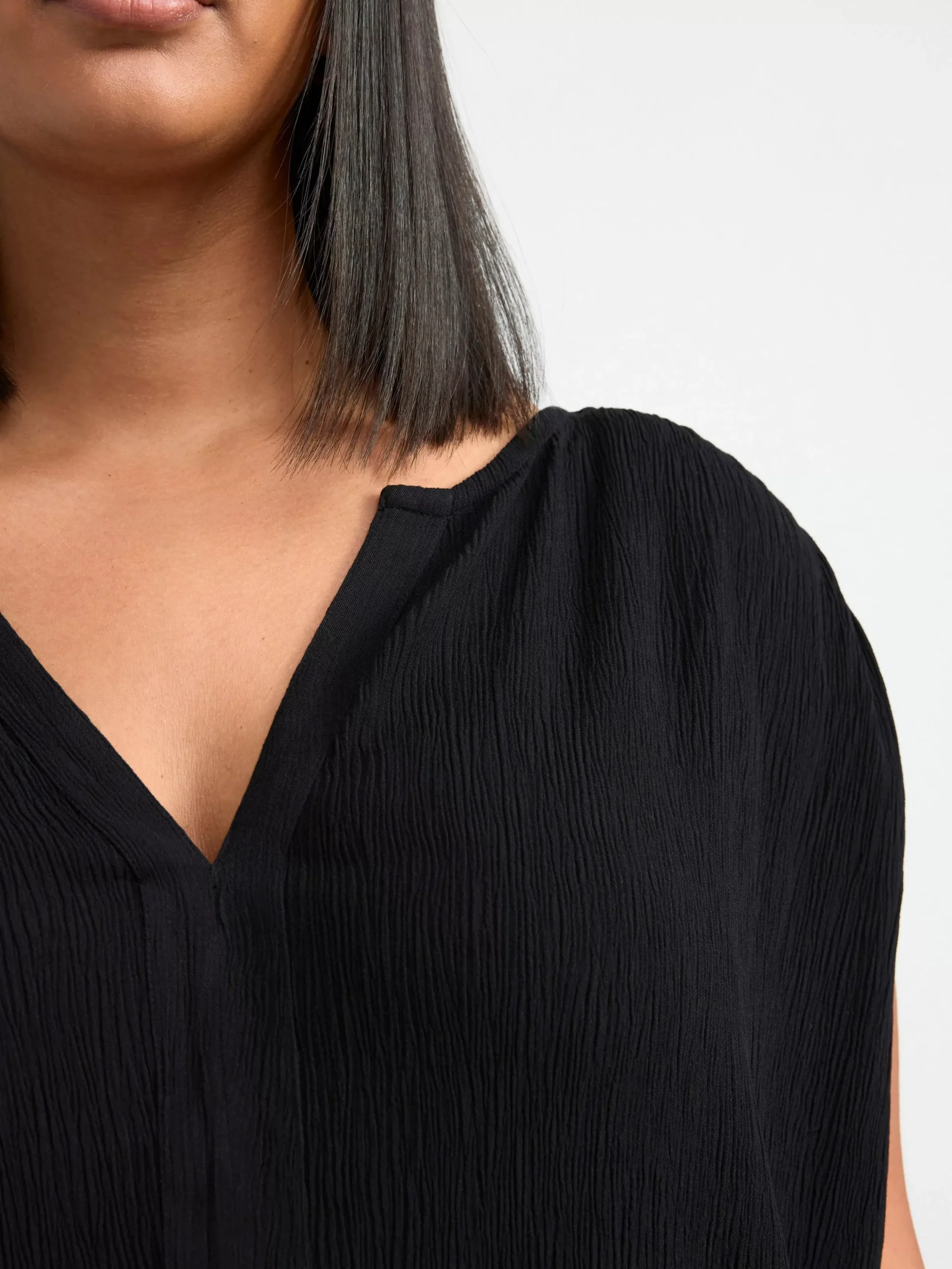 Toppar & T-Shirts>Lindex Armlos Topp Med V-Ringning Och Struktur Black