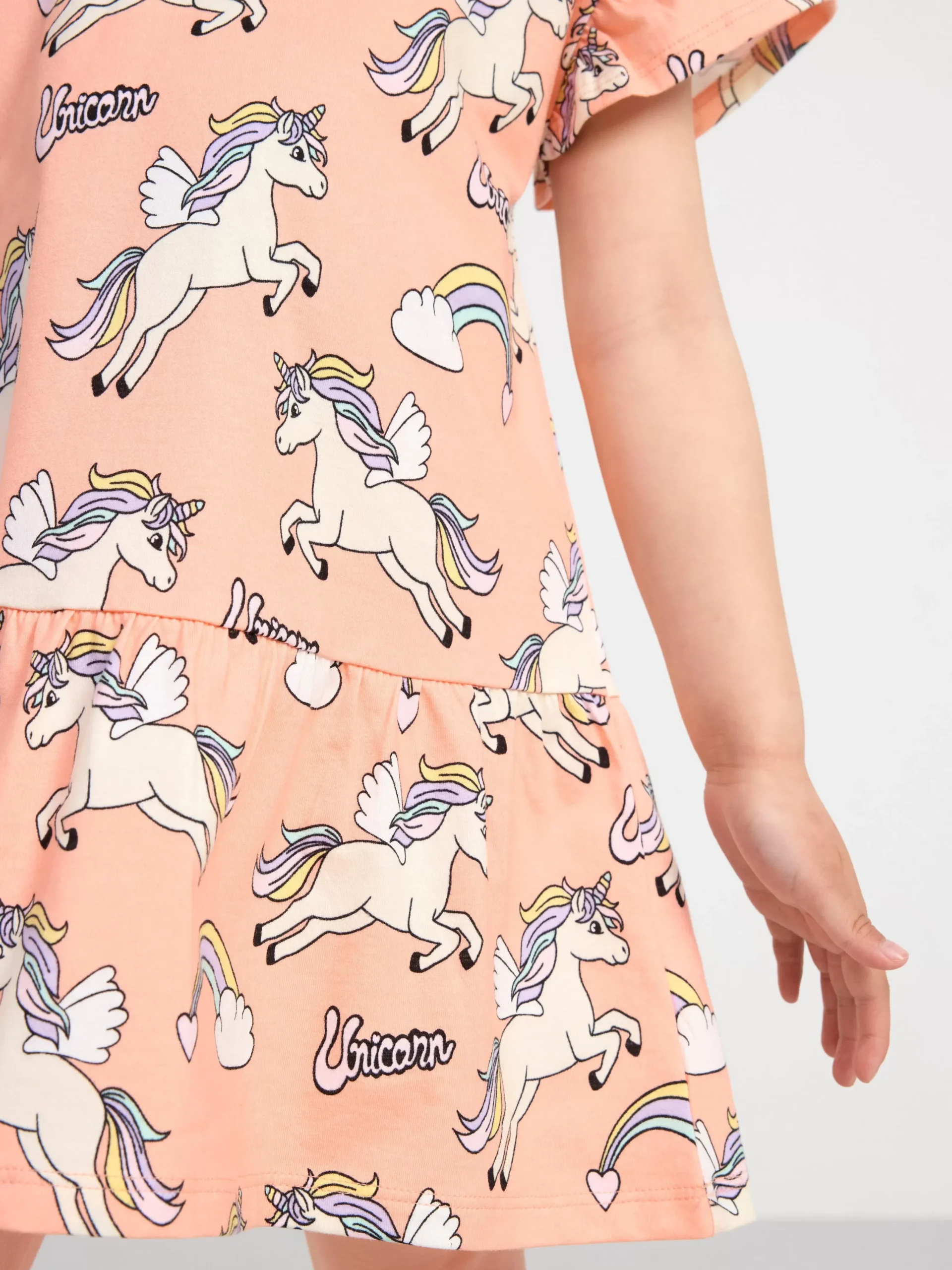 Toppar & T-Shirts>Lindex Kortarmad Klanning Med Enhorningar Light Coral