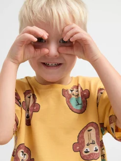 Toppar & T-Shirts>Lindex Kortarmad Topp Med Apor Light Dusty Yellow
