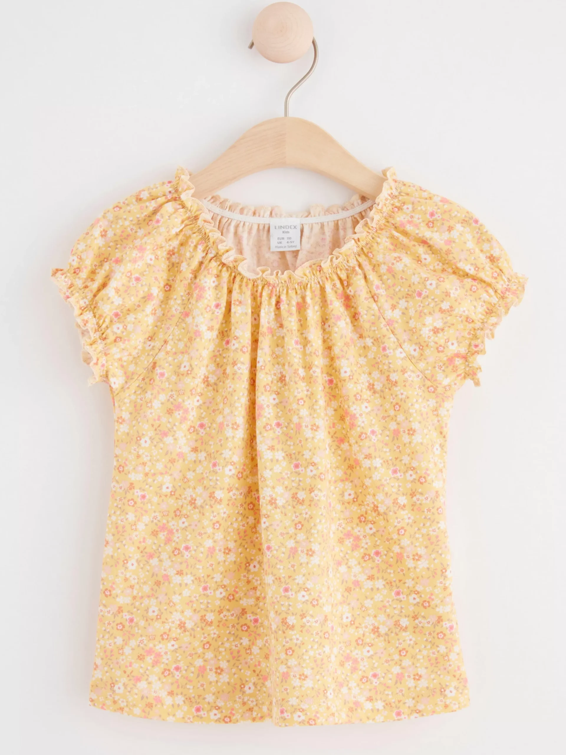 Toppar & T-Shirts>Lindex Kortarmad Topp Med Blommor Light Dusty Yellow