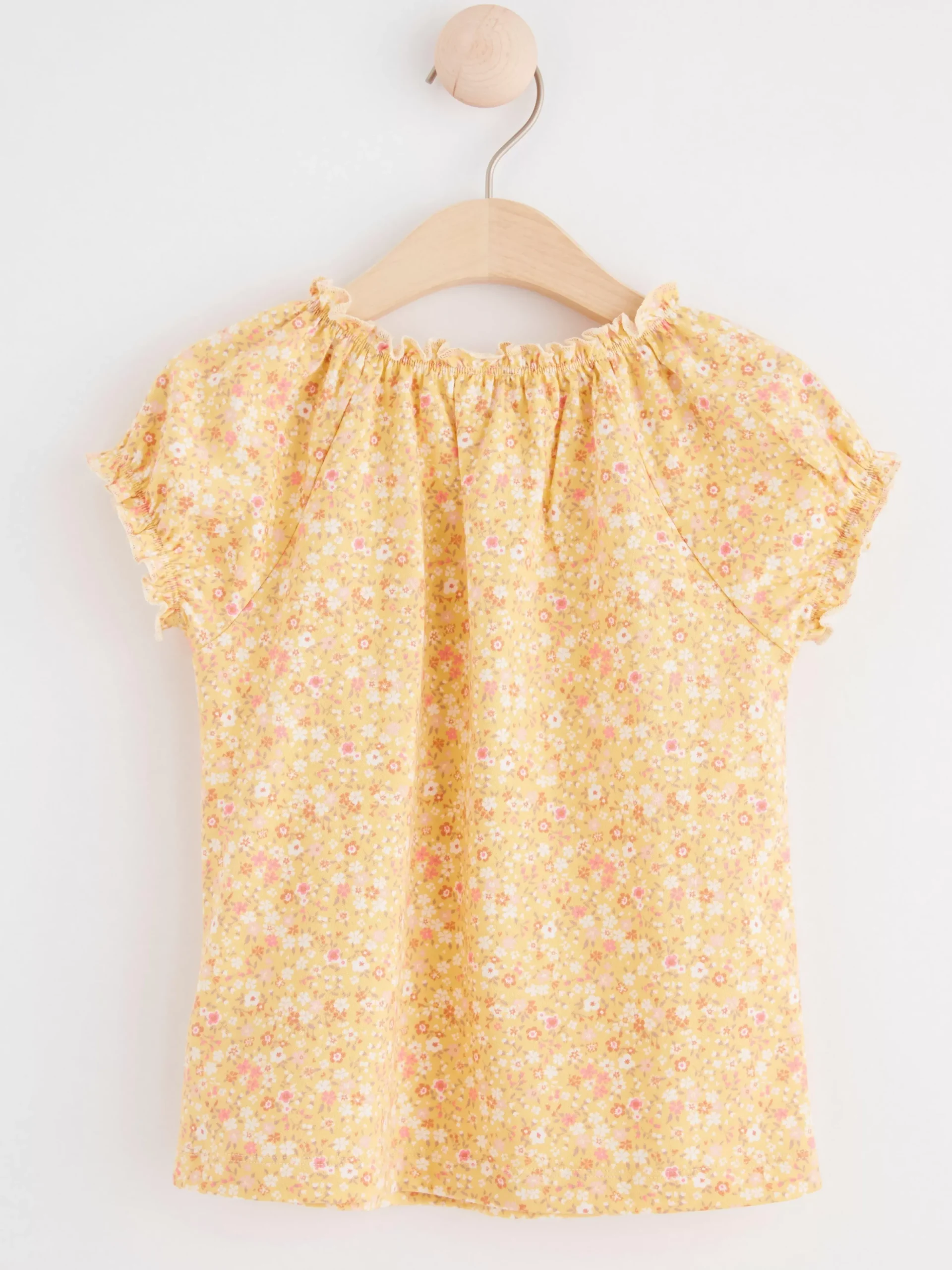 Toppar & T-Shirts>Lindex Kortarmad Topp Med Blommor Light Dusty Yellow